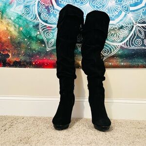 Show stopped knee high boots